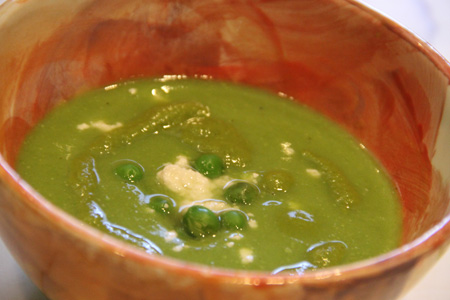 fresh pea soup with savory jalapeno oil