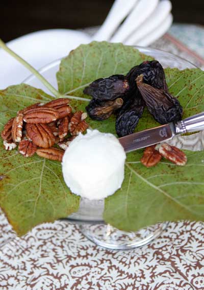 cheese plate with dried figs and walnuts